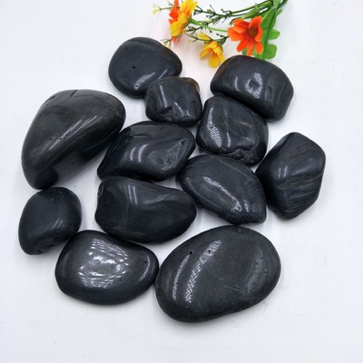 Pietra di marmo lucidata Pietra di marmo nera lucidata Pietra di marmo di fiume per paesaggio